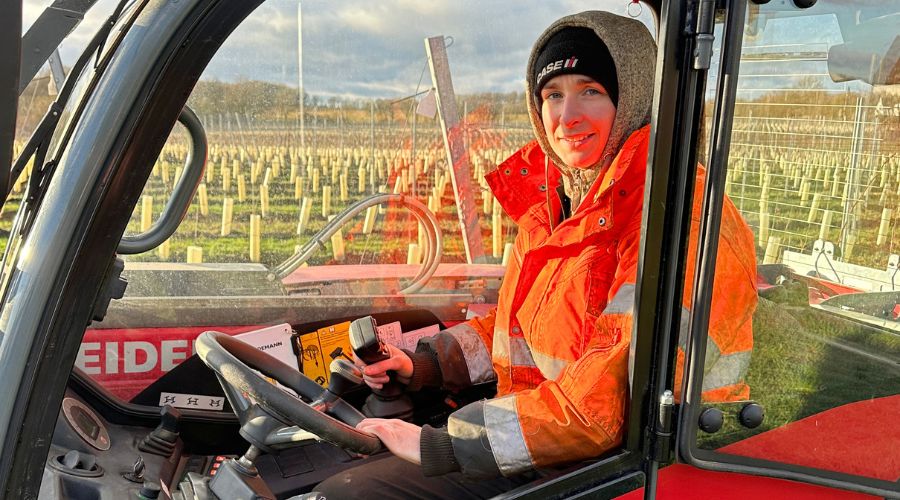 Chaldean Vineyard worker in telehandler